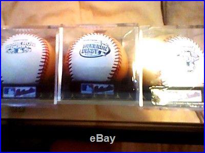 2009,10,11 home run derby gold balls with cases